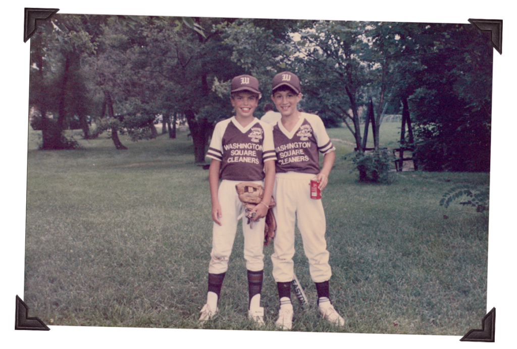 Me with a baseball teammate.